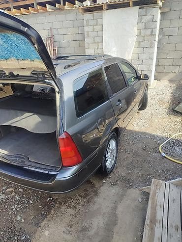 byd plus: Ford Focus: 2003 г., 2 л, Автомат, Газ, Универсал — 5