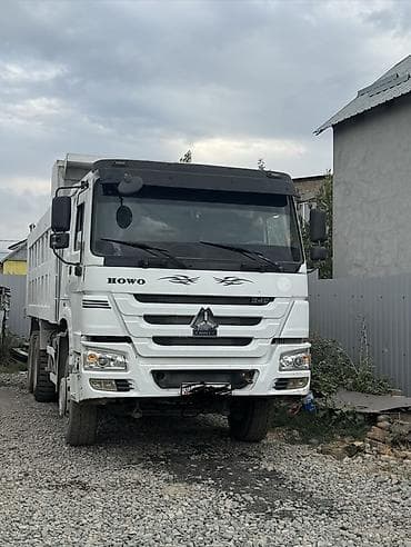 вольво самасывал: Самосвал HOWO 375 белого цвета с высокой металлической самосвальной — 1
