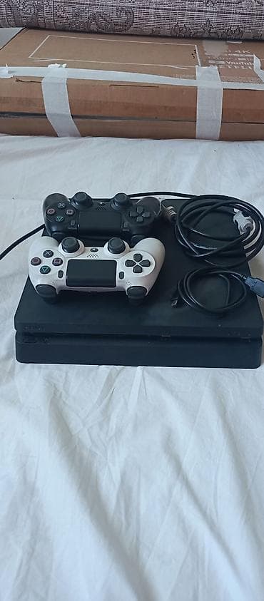 Игровая консоль Sony PlayStation 4 Slim (черная) В комплекте: - at lalafo.kg Игровая консоль Sony PlayStation 4 Slim (черная) В комплекте: -