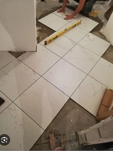 Услуги по укладке плитки и устройству фундаментов - Плиточные работы