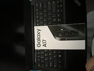лучшие телефоны до 15000: Samsung Galaxy A17, 256 ГБ, цвет - Черный, 2 SIM — 1