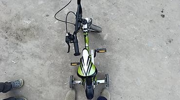 90: Детский велосипед Schwinn, зеленый с белыми и черными акцентами — 3
