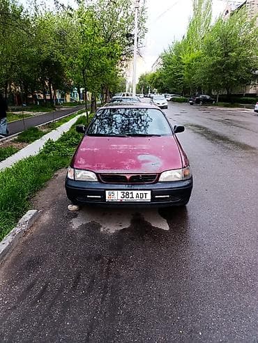 машина под выкуп: Toyota Carina E: 1997 г., Механика, Бензин, Седан — 1