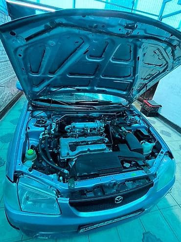 мазда хронос: Mazda 323: 2000 г., 1.5 л, Механика, Бензин, Хэтчбэк — 3