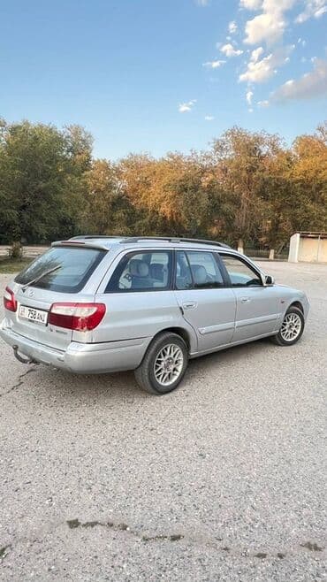 матизге шина: Mazda Capella: 2001 г., Механика, Универсал — 6