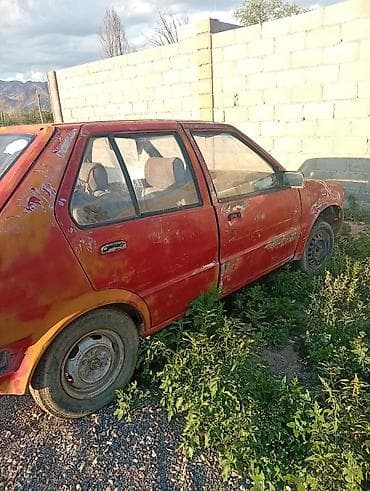 Унаа: Nissan Март: 1990 г., Хетчбек — 4