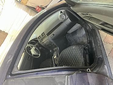 11 r20: Mazda 3: 2005 г., Седан — 5