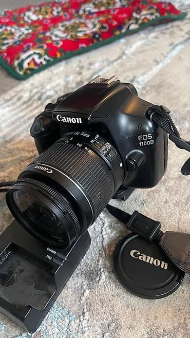 таймер времени: Зеркальная камера Canon EOS 1100D с комплектным объективом Canon EF-S — 1