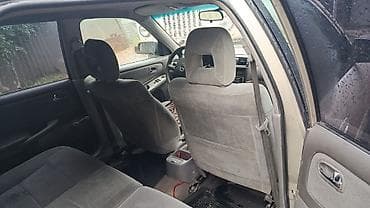 Транспорт: Mazda Capella: 2002 г., 1.8 л, Механика, Бензин, Универсал — 4
