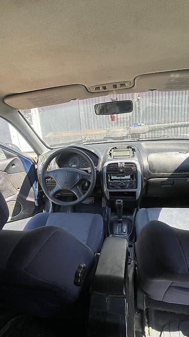 купить авто в караколе: Mitsubishi Carisma: 2002 г., 1.6 л, Автомат, Бензин, Седан — 9
