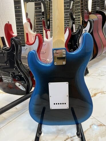 Гитаралар: Электрогитара новая, стратокастер, ST, Stratocaster. Все в наличии В — 3