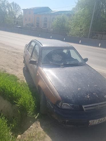 бампер нексия 1: Daewoo Nexia: 1995 г., Механика, Седан — 2