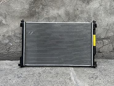 Радиатор охлаждения и электровентилятор в сборе для Toyota. Состав: -