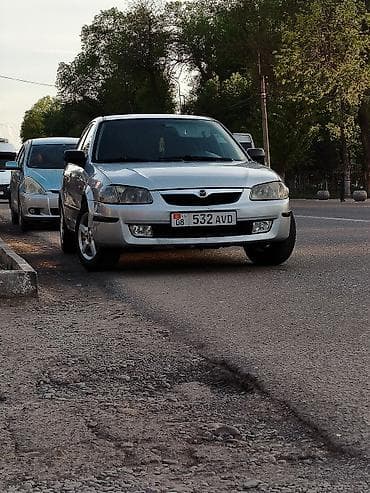 Mazda 323: 1999 г., 1.5 л, Ручные, Бензин, Универсал