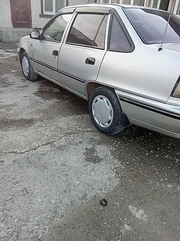 каропка на тико: Daewoo Nexia: 2004 г., 1.5 л, Механика, Бензин, Седан — 3