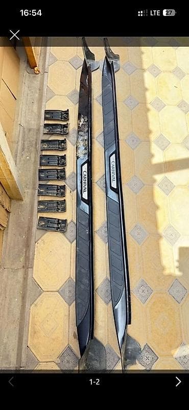 наклатки: Наружные накладки порогов Kia — 1