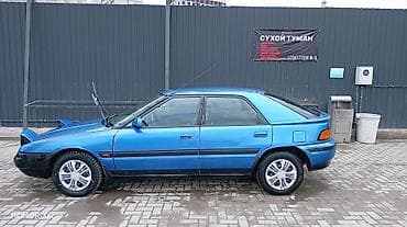 byd e2 2022: Mazda 323: 1992 г., 1.6 л, Автомат, Бензин, Хэтчбэк — 8