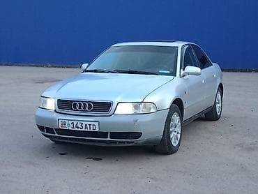 Транспорт: Audi A4: 1995 г., Бензин — 1