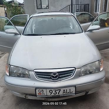 mazda 121: Mazda 626: 2001 г., 2 л, Автомат, Седан — 4