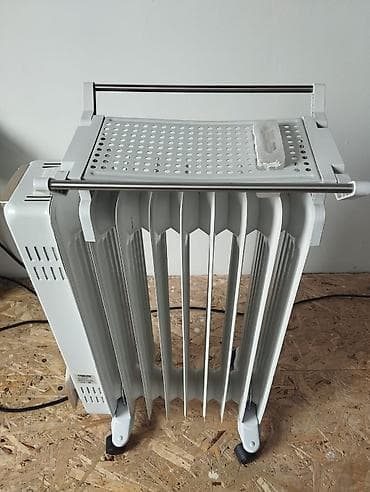 стальные радиаторы: Масляный обогреватель Кол-во секций: 10 и более, Быстрый нагрев — 1