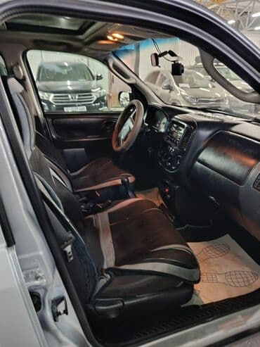 срочно продаю в связи с переездом: Ford Maverick: 2003 г., 2 л, Механика, Бензин, Кроссовер — 13