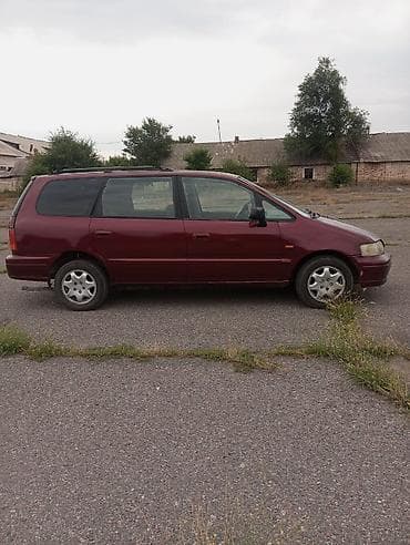 муравей с бензином: Honda Odyssey: 1997 г., 2.3 л, Автомат, Газ, Минивэн — 2