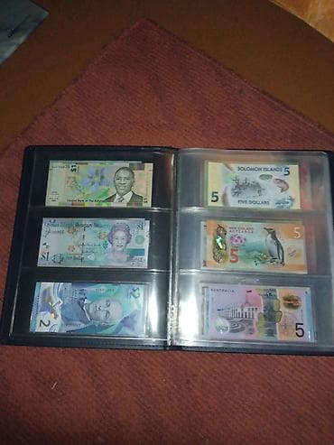 коллекционные монеты: Коллекционный альбом с иностранными банкнотами 63 банкноты+ альбом - — 3