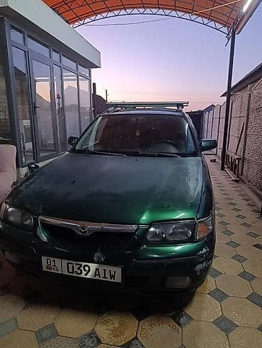 Транспорт: Mazda 626: 1999 г., 1.8 л, Механика, Бензин, Универсал — 3