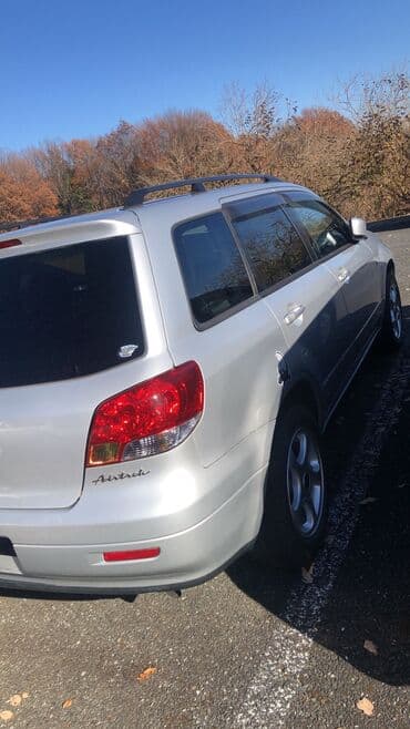 гранаты мазда: Митсубиси Аэртрек — 2