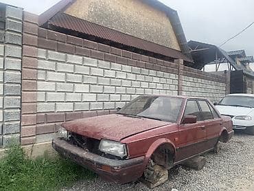 mini kooper: Nissan Bluebird: 1989 г., Седан — 2