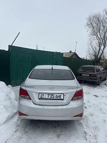 ej 205: Hyundai Solaris: 2015 г., Механика, Седан — 5