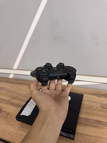 game controller: Sony PlayStation 3 (Slim). Игровая приставка с жёстким диском 149 ГБ — 6