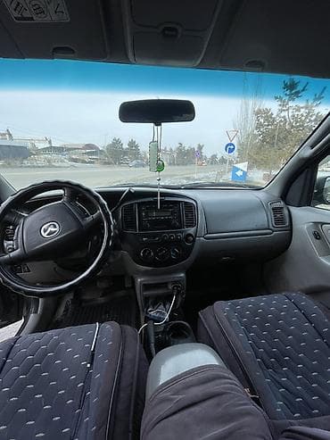 bid e5: Mazda Tribute: 2002 г., Кроссовер — 5