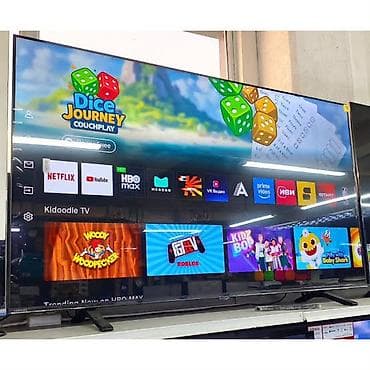 Смарт‑телевизор с большим экраном и установленной платформой для