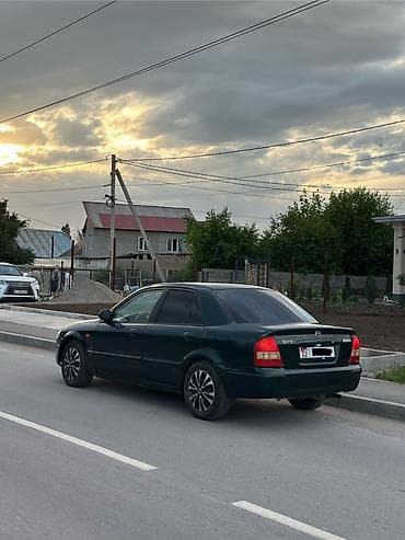 мазду: Mazda 323: 2000 г., 1.3 л, Механика, Бензин, Седан — 9