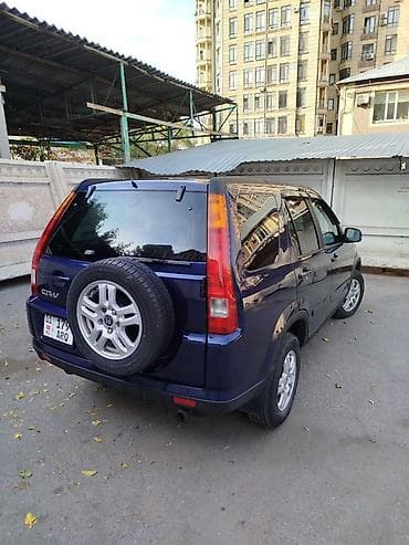диск на мото: Honda CR-V: 2002 г., 2.4 л, Автомат, Газ, Универсал — 4