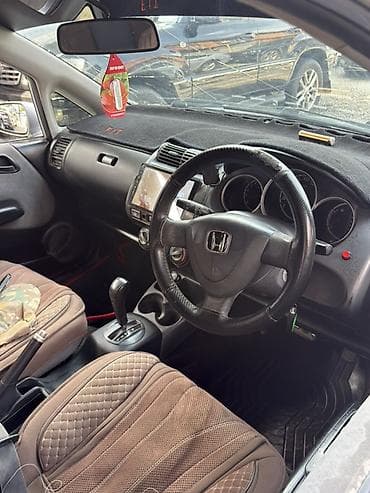бамперы на гольф 3: Honda Fit: 2003 г., 1.3 л, Автомат, Бензин, Хэтчбэк — 2