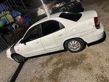 скутера на продажу: Белый седан, компактного класса. Основные характеристики по фото: - — 2