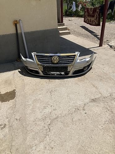 Передний бампер с решеткой радиатора и эмблемой для Volkswagen Passat