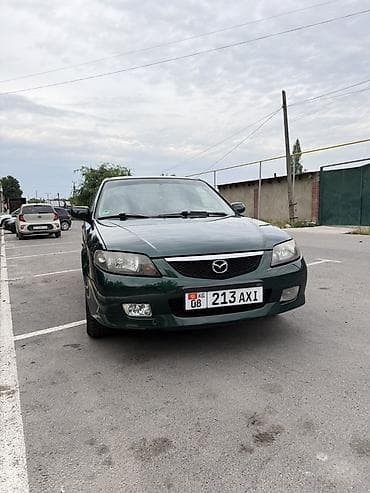 mistra: Mazda 323: 2003 г., 1.6 л, Автомат, Бензин, Универсал — 3