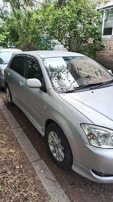 e 303: Toyota Allex: 2003 г. — 3