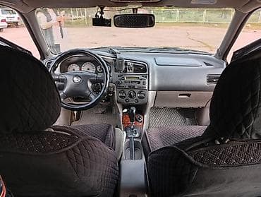 195 60 14: Nissan Wingroad: 2000 г., 2 л, Автомат, Бензин, Универсал — 10