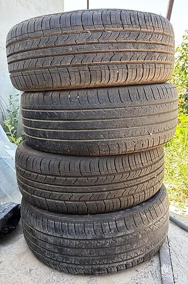 Транспорт: Комплект из 4 летних шин P215/55 R17 94V. - Тип: летние, дорожный — 2