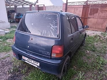 кассеты аудио: Daihatsu Cuore: 1993 г., 1.1 л, Механика, Бензин, Хэтчбэк — 4