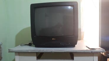 мерседес 2 9: Телевизор LG с кинескопом (CRT), диагональ экрана около 21–23". Корпус — 1