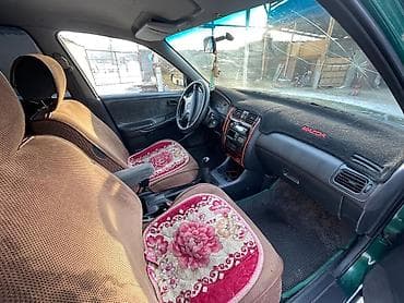 наклейки для авто: Mazda 626: 1998 г., 2 л, Механика, Универсал — 4