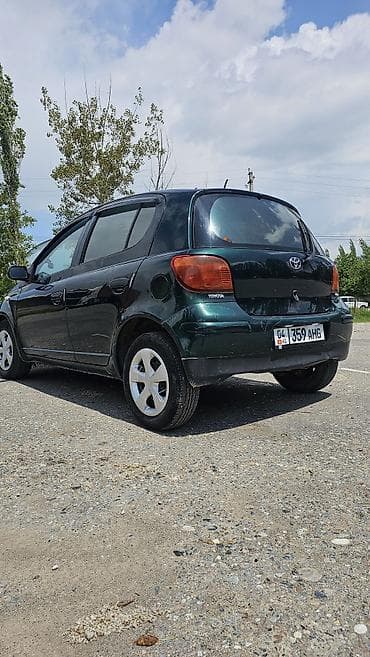 Транспорт: Toyota Yaris: 2004 г., 0.1 - engine capacity л, Кол менен иштөөчү, Бензин, Хетчбек — 3