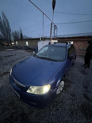 кытай мото: Mazda 323: 2000 г., 2 л, Кол менен иштөөчү, Дизель, Хетчбек — 3
