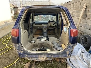 mazda demio амортизатор: Разбор на запчасти: Mazda Demio 2003, 2-Поколение, цвет темно‑синий — 3