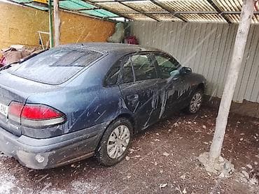 mazda cronos: Mazda 626: 1997 г., 1.8 л, Механика, Седан — 9